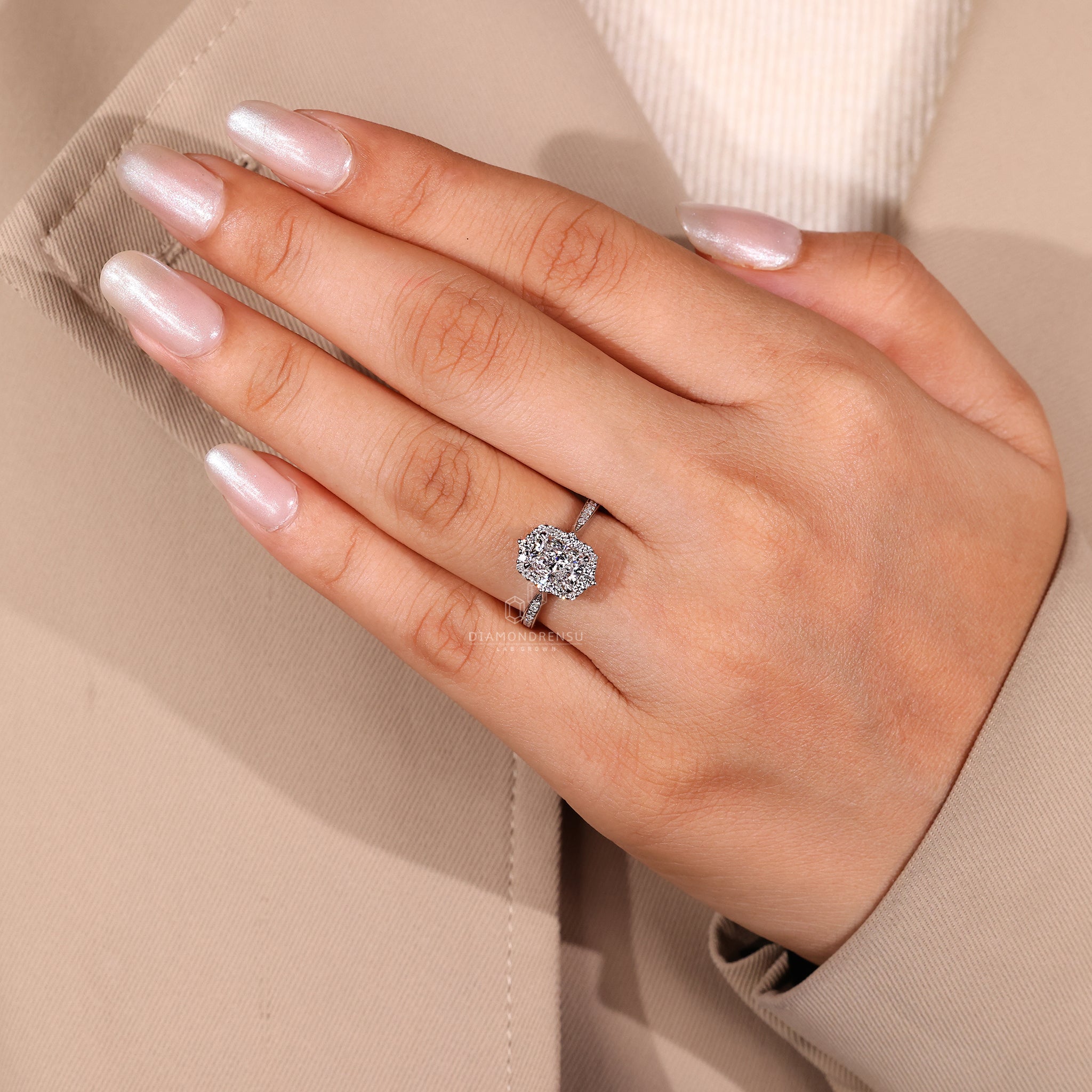 Custom engagement ring with round and radiant stones.

