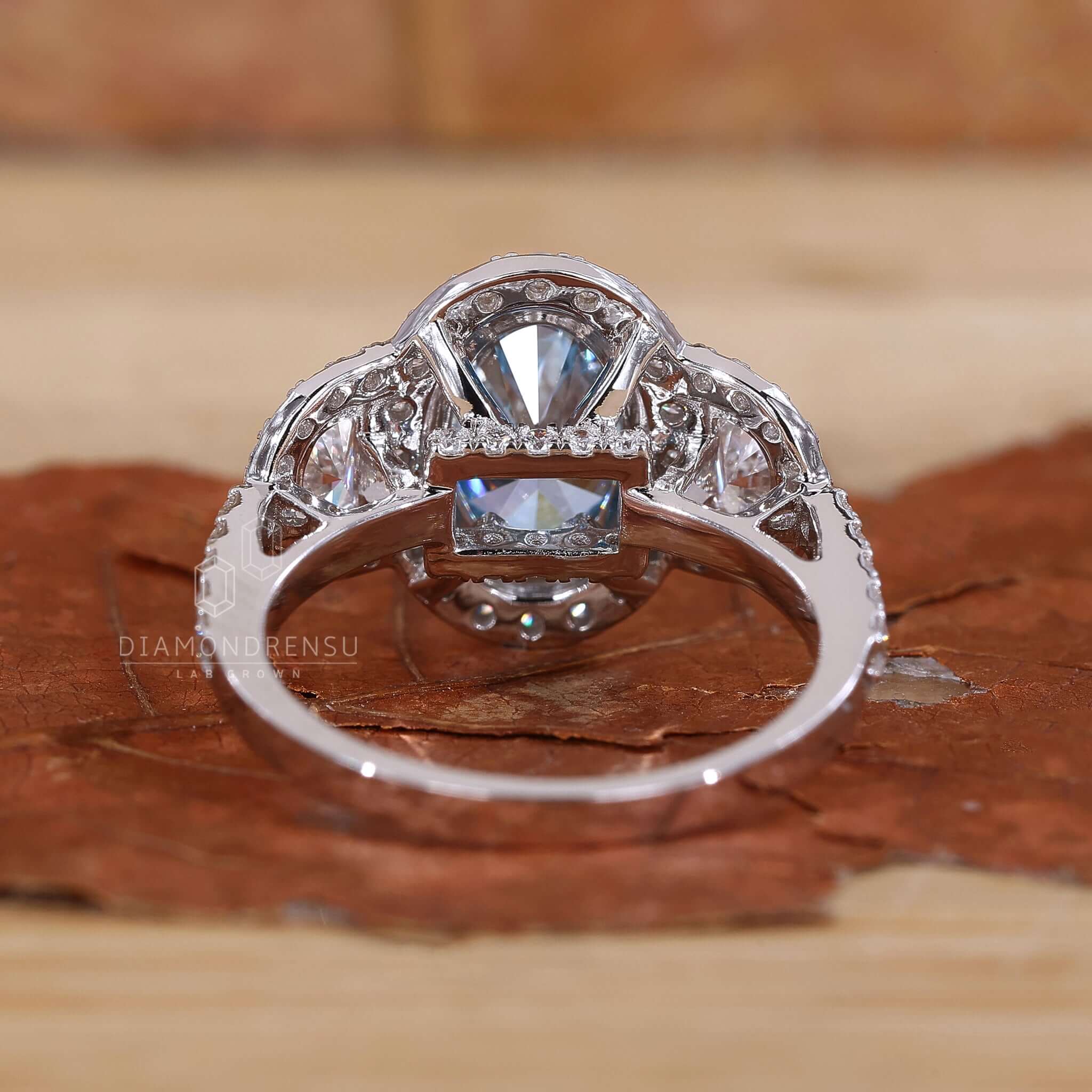 Oval Blue Diamond Engagement Ring that combines the beauty of a blue diamond with an oval cut.