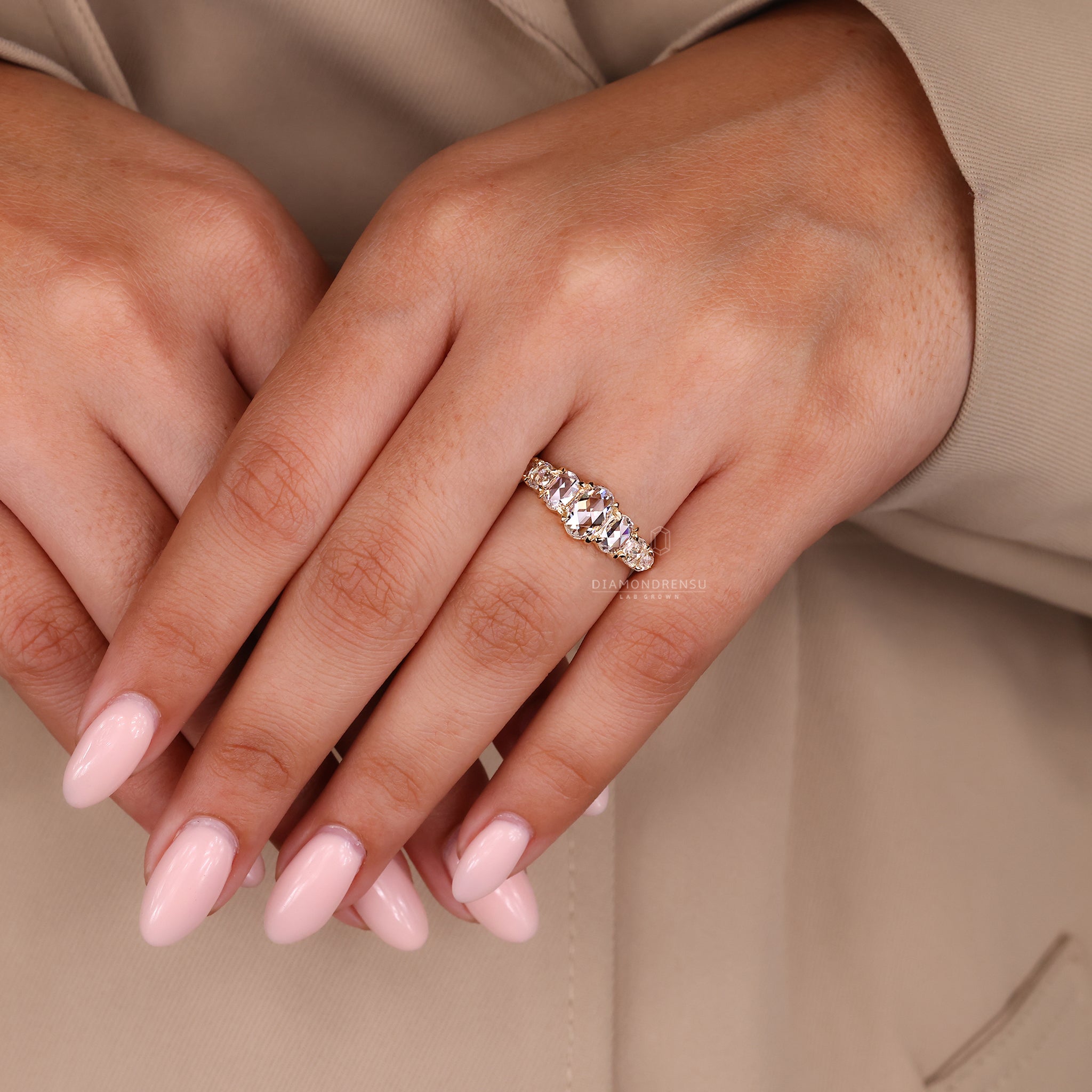 Yellow gold engagement ring with oval rose cut center.
