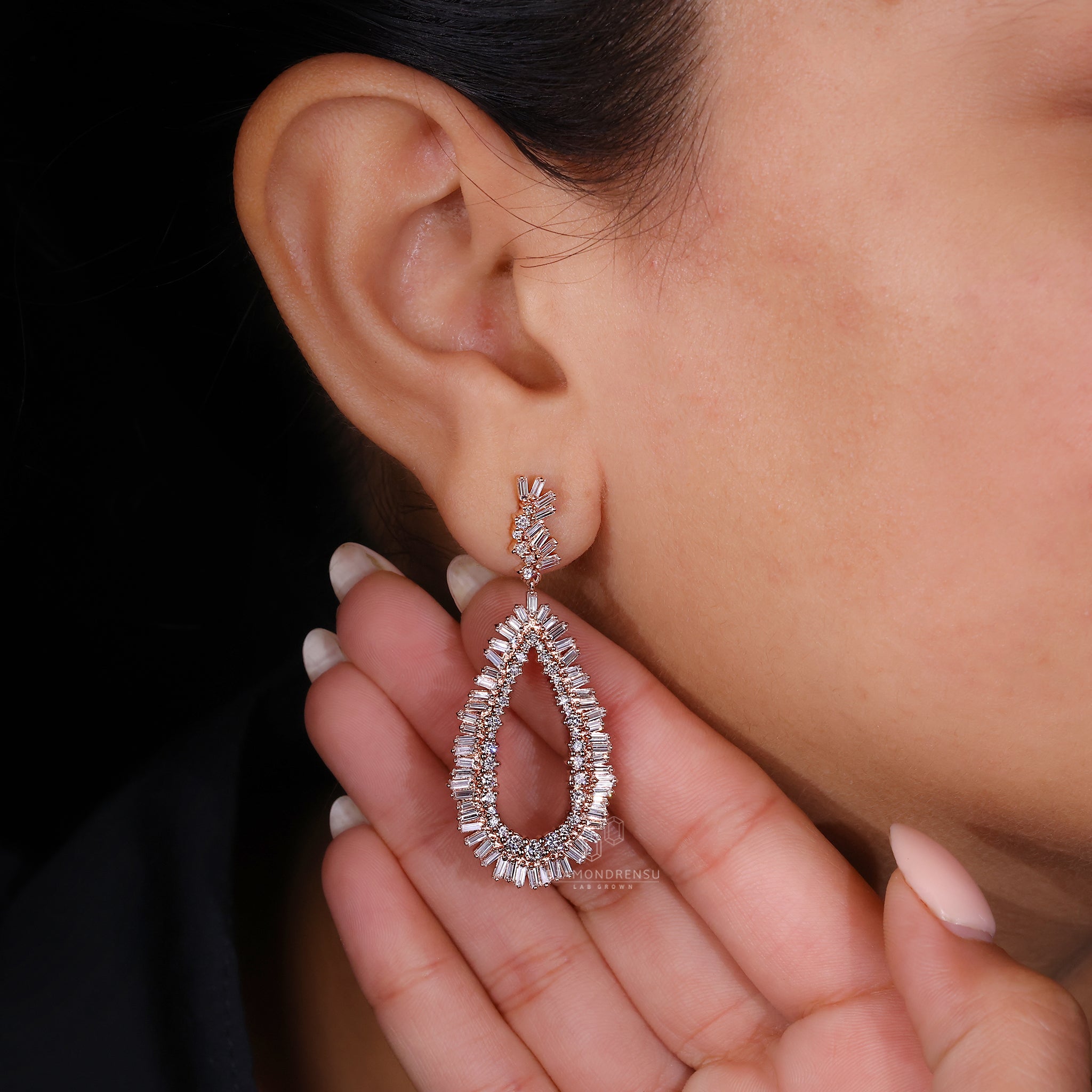 Handmade earrings with prong and cluster setting.
