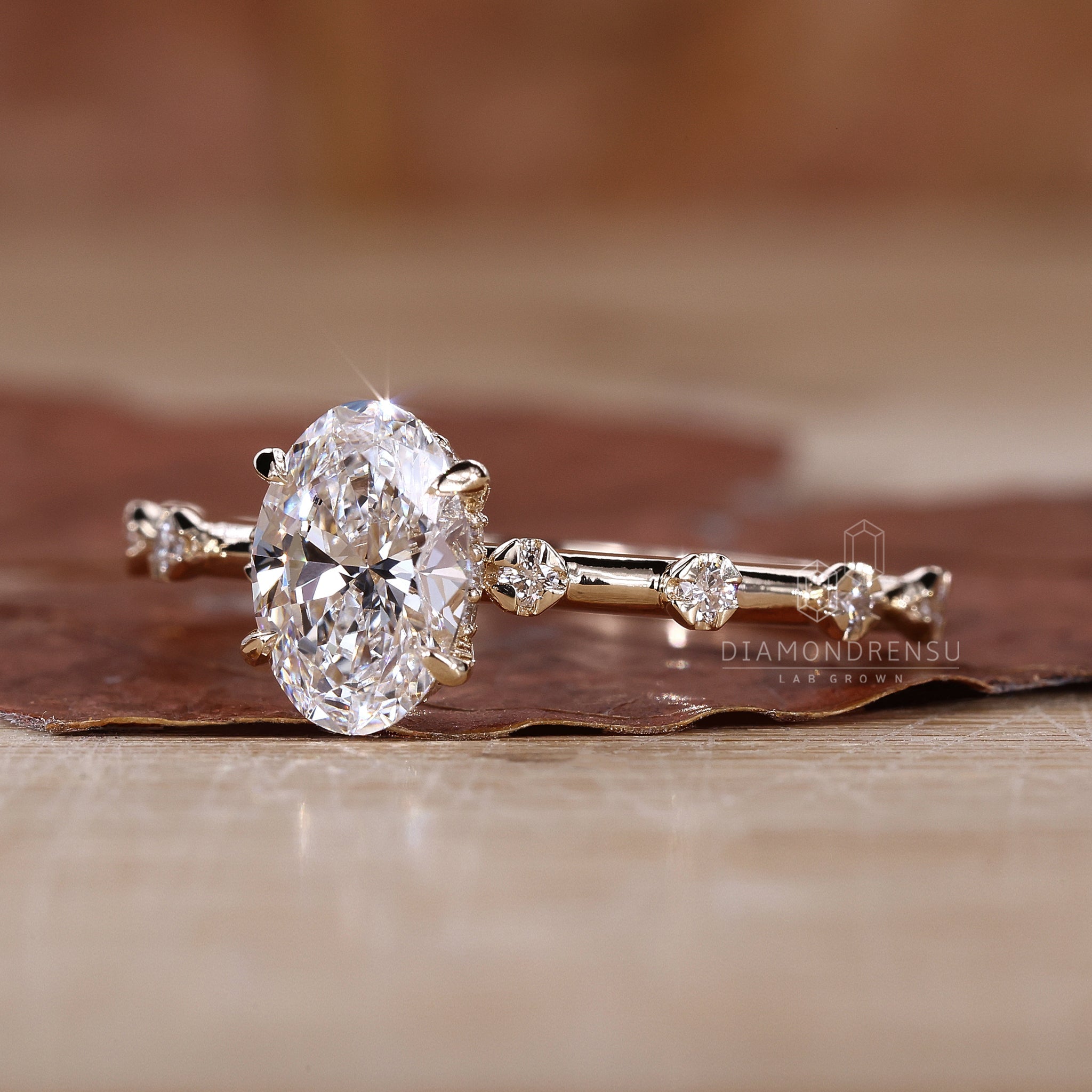 Hidden halo diamond ring featuring a sparkling centrepiece.