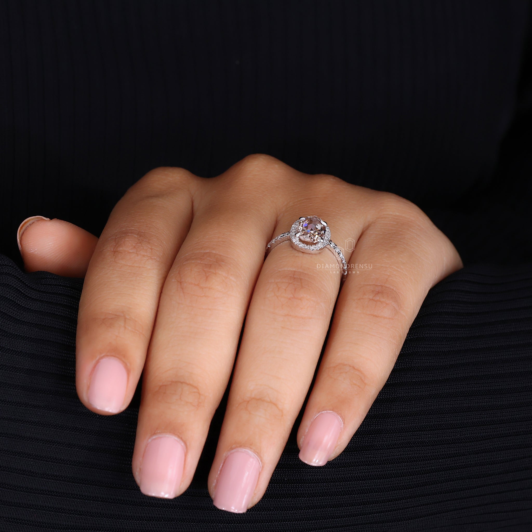4 prong setting on white gold ring.

