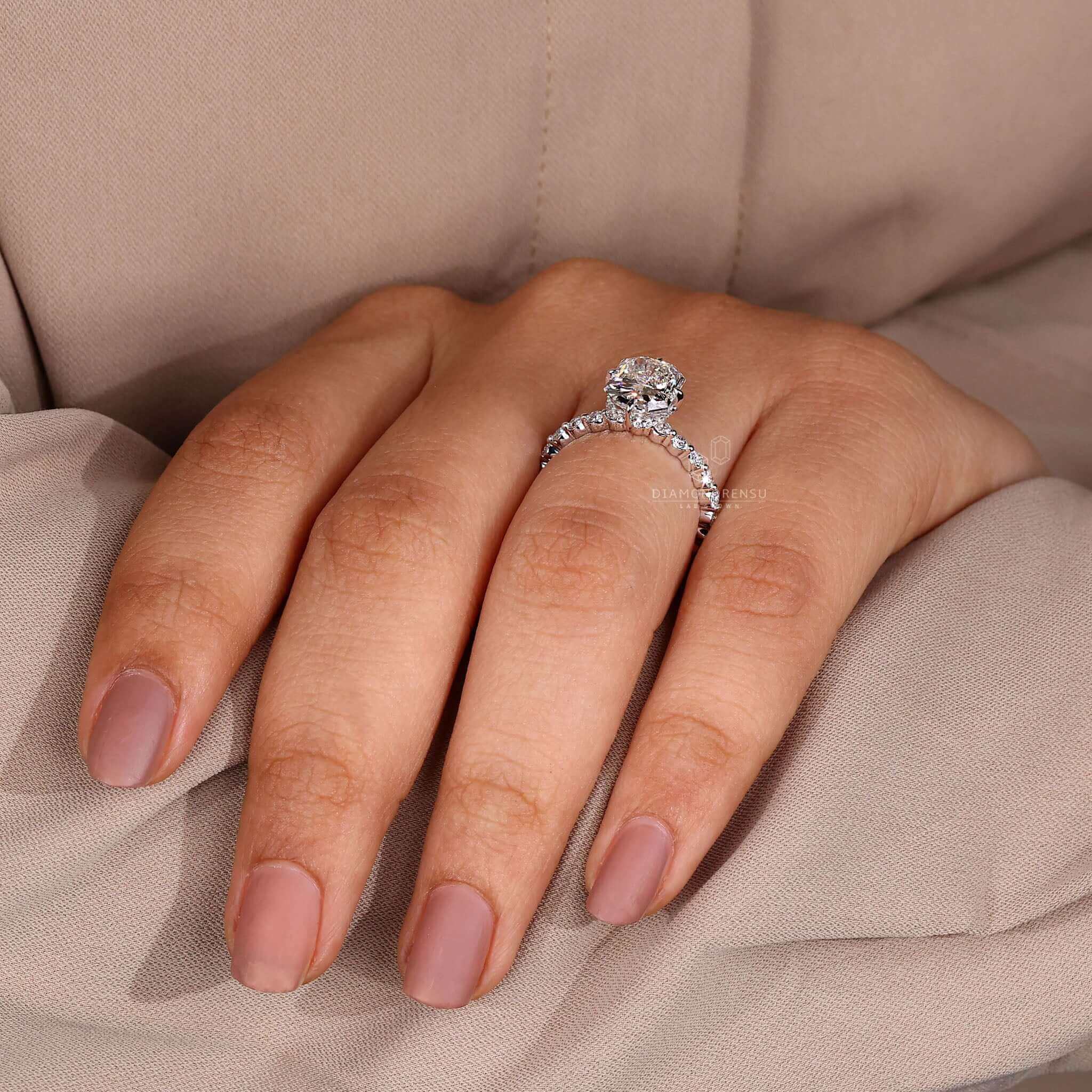 Pave ring diamond with a hidden halo engagement ring and a white gold band for elegance.