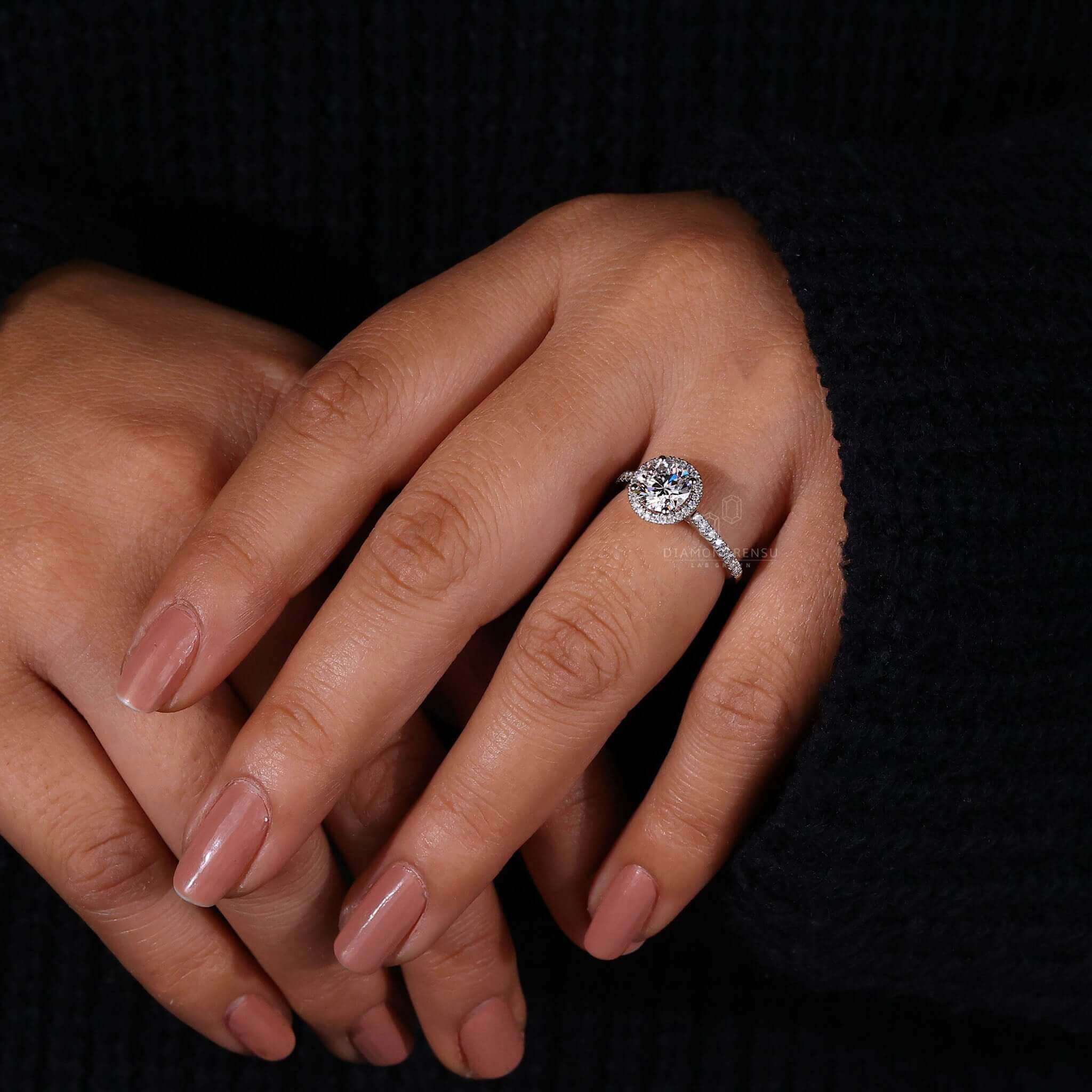 Stunning halo engagement ring highlighting shimmering diamonds.