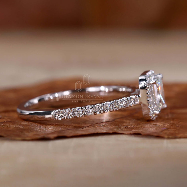 Pave diamond ring with intricate craftsmanship and certified diamonds.