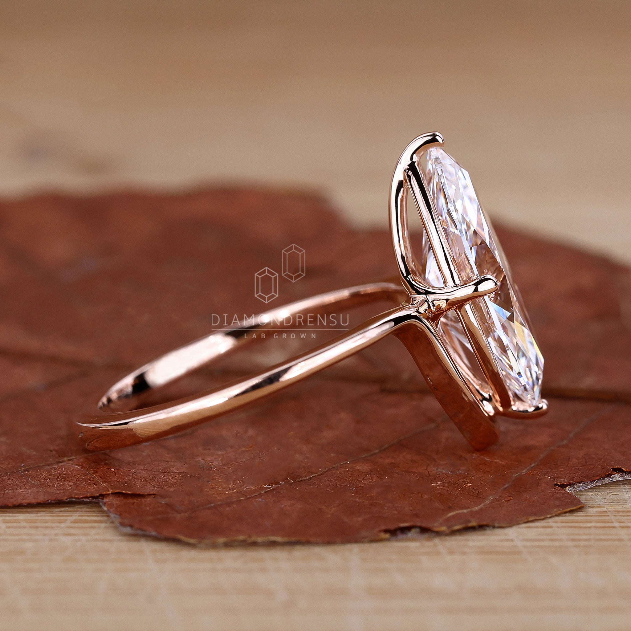 Marquise diamond engagement ring in rose gold.
