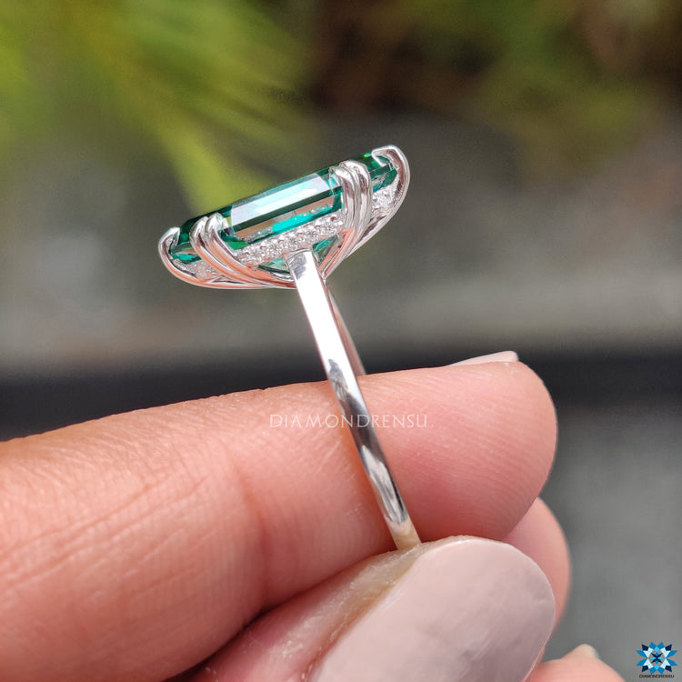 Handmade ring crafted in white gold with double claw prong setting.
