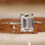 Elegant Emerald Cut Engagement Ring with a stunning diamond centre for a timeless look.