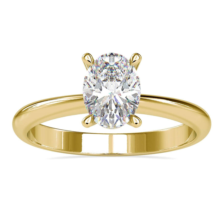 Oval solitaire engagement ring with 4 claw prong setting
