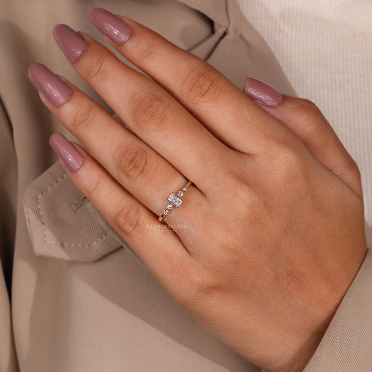 6 prong setting ring featuring radiant cut diamond.
