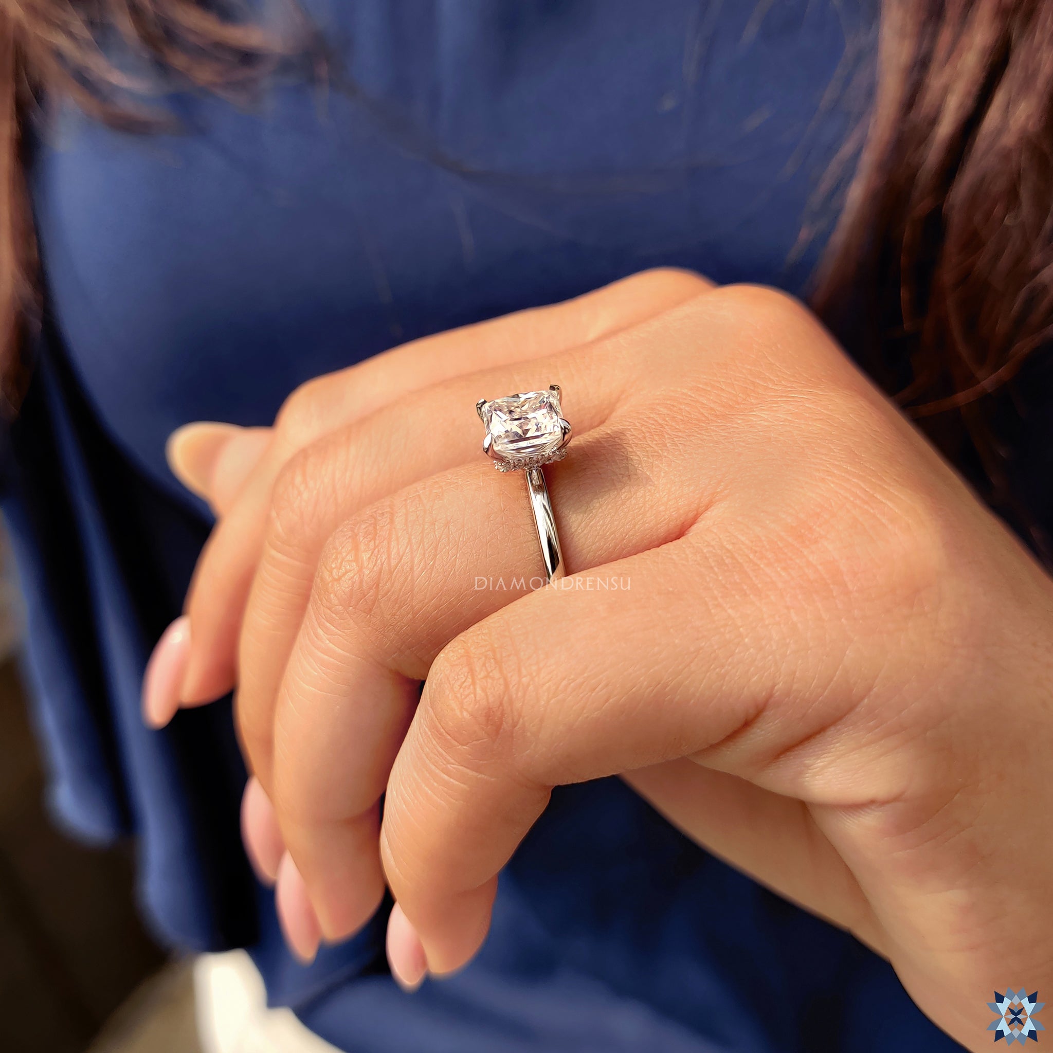 Round Moissanite hidden halo in white gold ring
