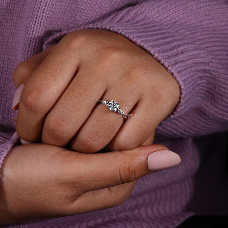 Diamond tapered baguette design with a 4 prong diamond ring, ideal for an elegant and classic engagement ring.
