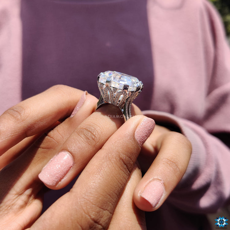 Buy engagement ring with Asscher cut moissanite and elegant side stones.
