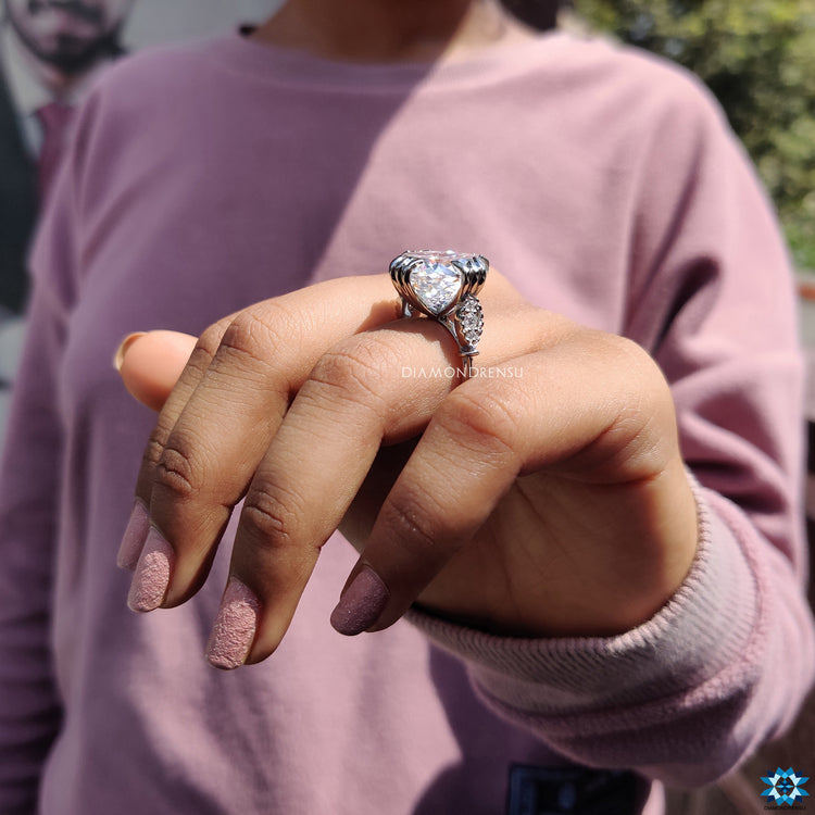 Custom engagement ring designed with vintage charm and fishtail prong setting.
