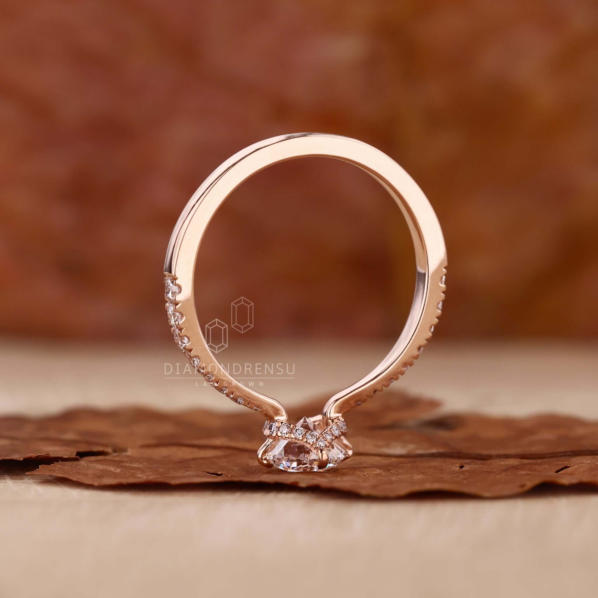 Gold round diamond ring with a timeless design and brilliant sparkle.