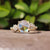 Rose cut engagement ring set in yellow gold with claw prong design.
