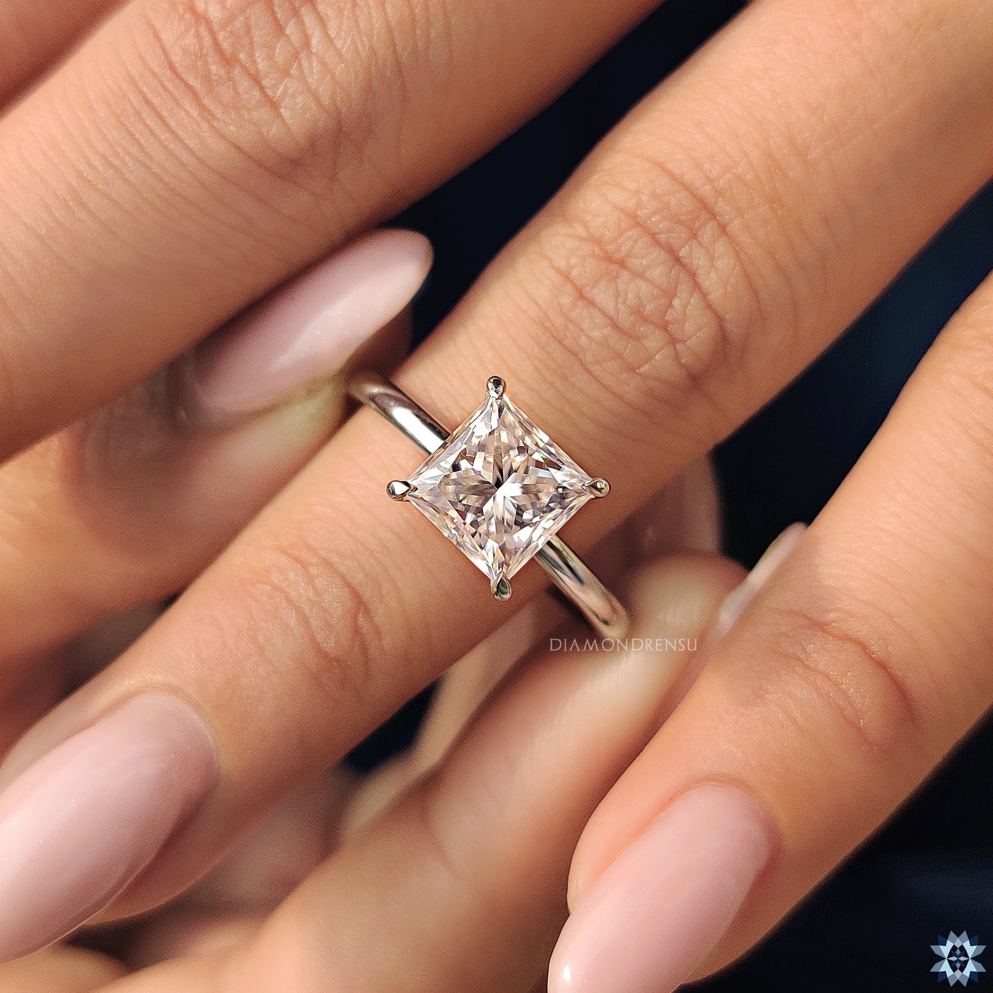 Claw prong ring in custom engagement ring style

