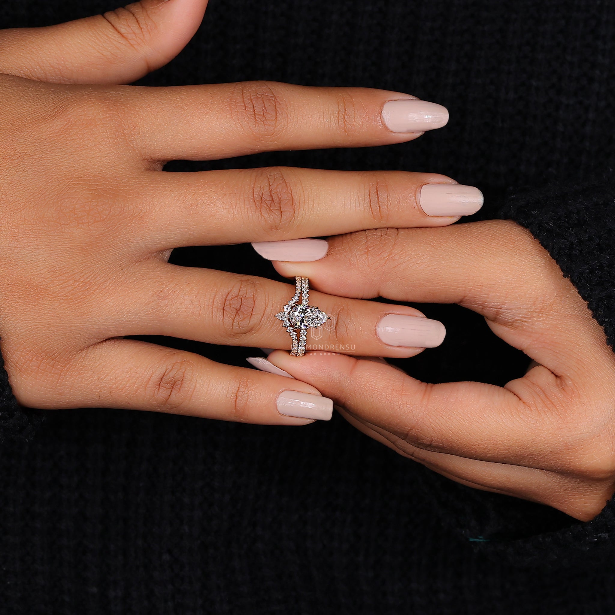 Curved wedding band and engagement ring.
