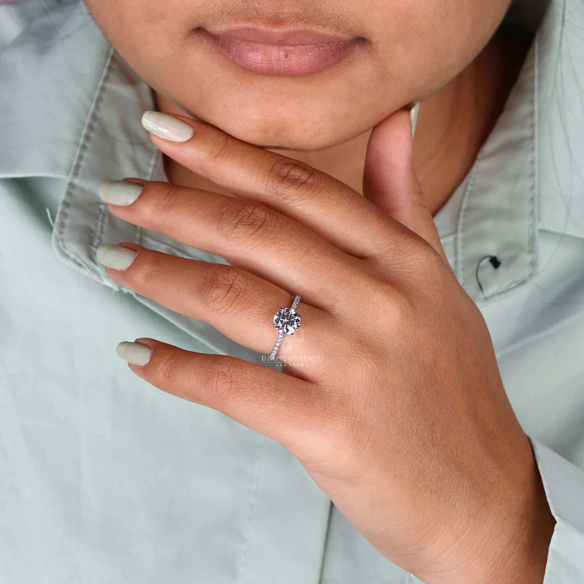 2 carat round diamond ring in a cathedral setting engagement ring design, perfect for unique engagement celebrations.