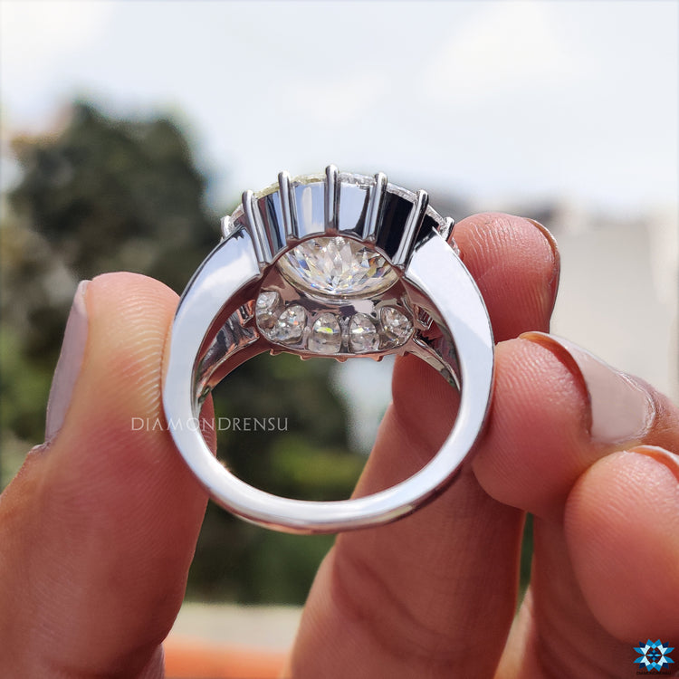 Diamondrensu UK engagement ring with trillion cut halo moissanite setting.
