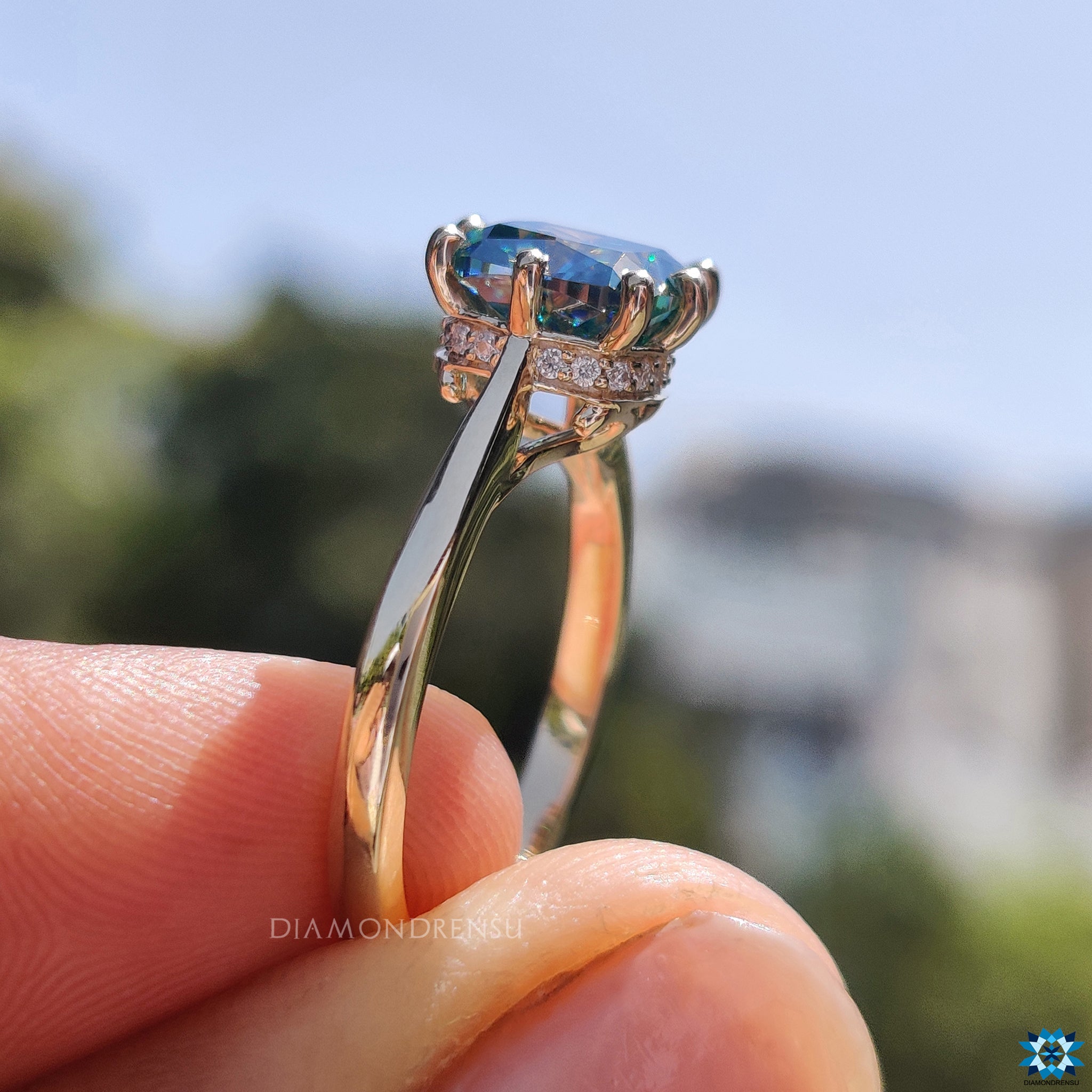 Cushion engagement ring with 8 prong setting and tapered shank band.
