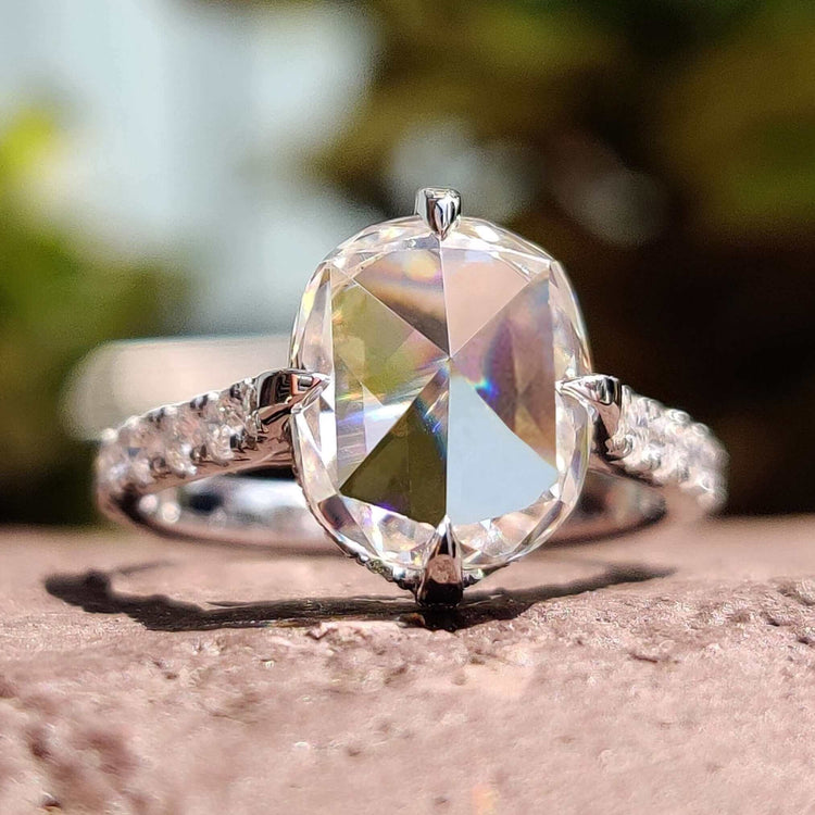 Cushion cut rose moissanite engagement ring in white gold.
