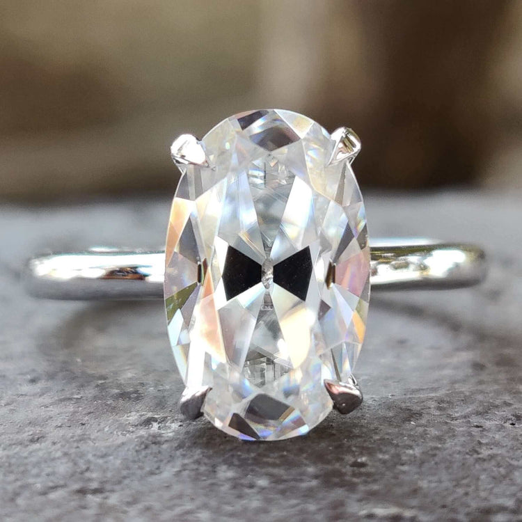 Moval old European cut moissanite solitaire ring in white gold.
