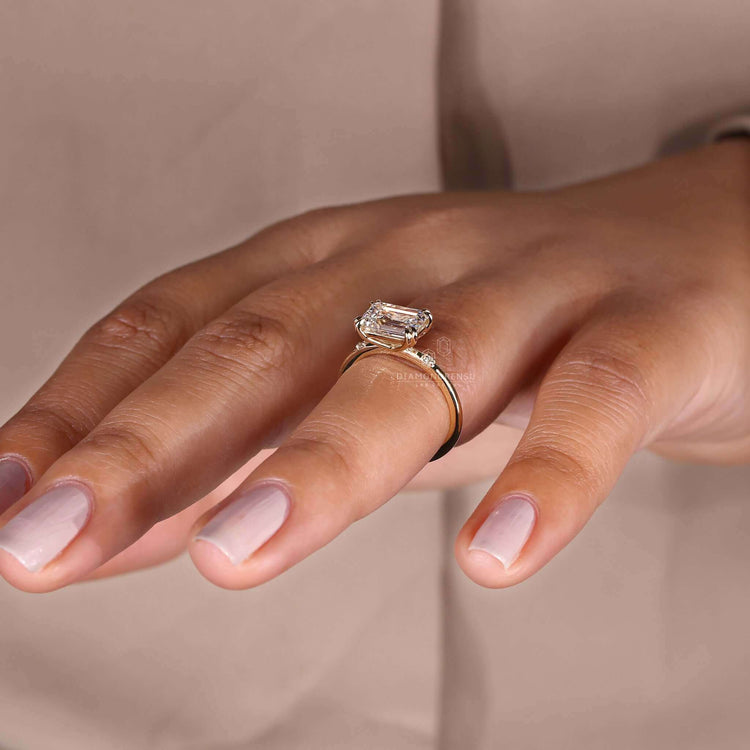 Handmade emerald cut diamond engagement ring with lab grown diamonds.