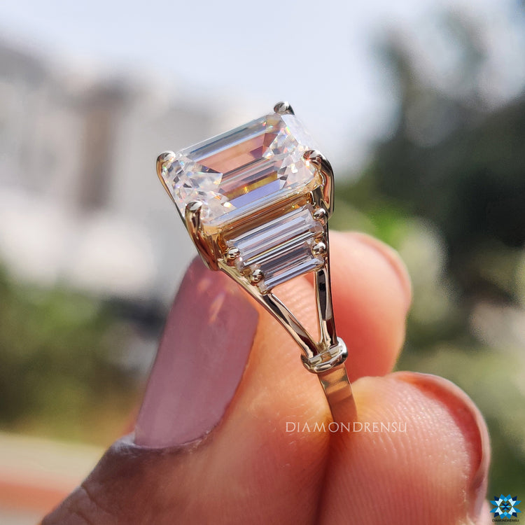 Buy emerald cut moissanite ring with baguette side stones.
