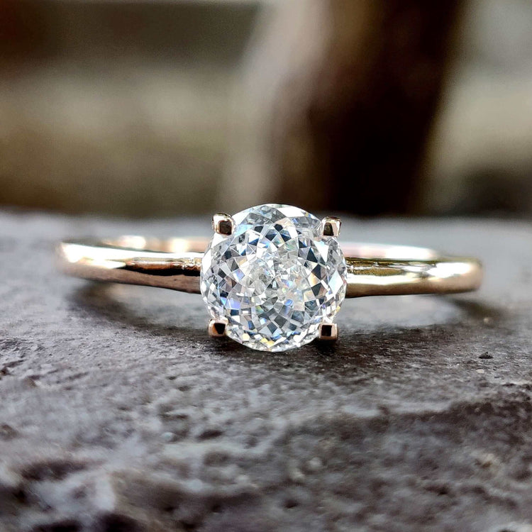Portuguese cut moissanite ring in rose gold.
