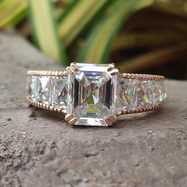 Vintage emerald moissanite engagement ring.
