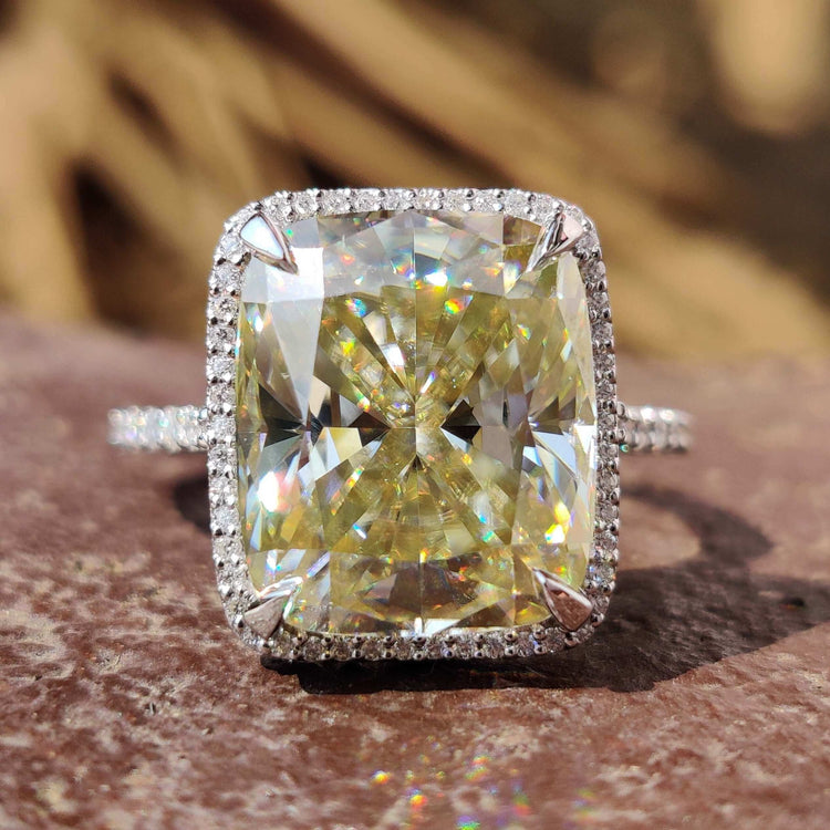 Elongated cushion cut moissanite engagement ring in white gold.
