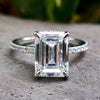 Emerald Cut Ring featuring a stunning emerald cut moissanite ring design.