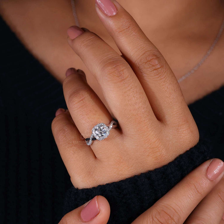 Twist engagement ring crafted with pave diamonds and a silver twist ring band for a modern and unique style.
