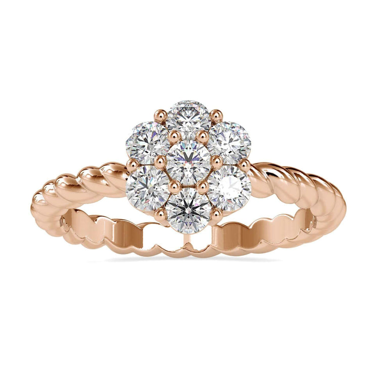 Twisted band engagement ring with round diamond cluster halo.
