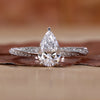 Pear shaped engagement ring with a stunning diamond.