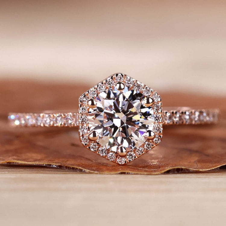 Round diamond ring with a classic 2 carat round diamond, perfect for UK engagement ring traditions.