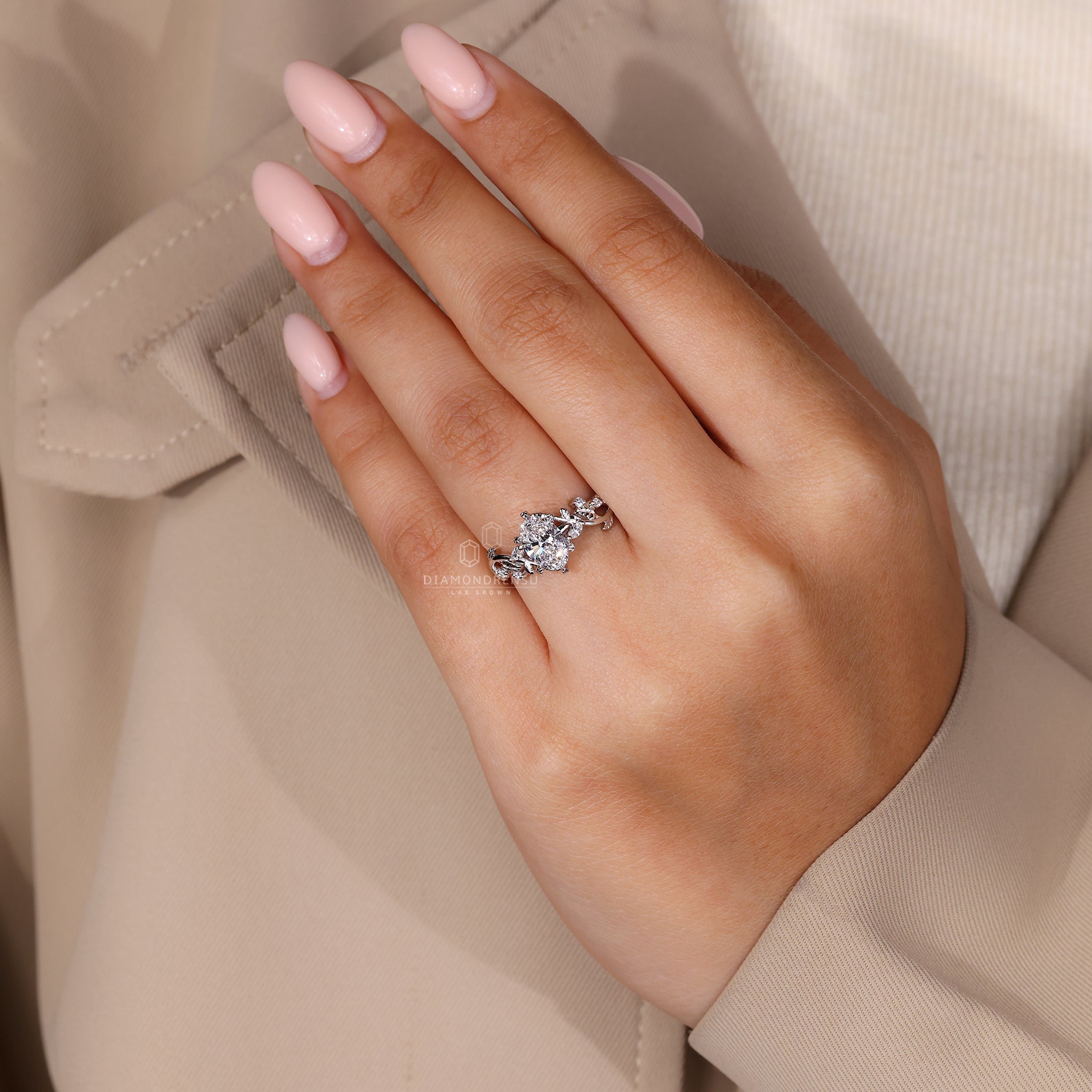 Diamond Ring UK crafted in white gold with vine design.