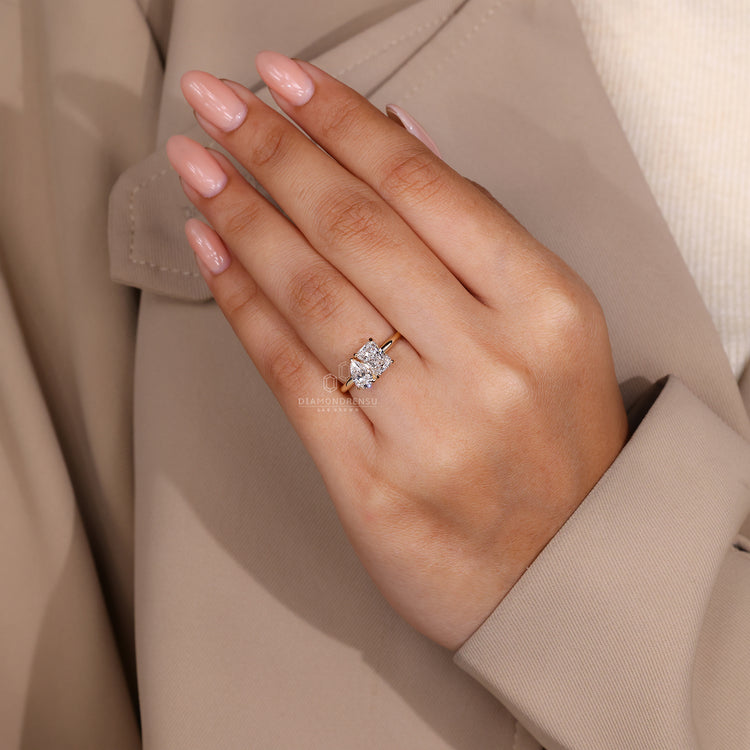 Radiant Cut Diamond placed beside pear cut diamond in two stone style.