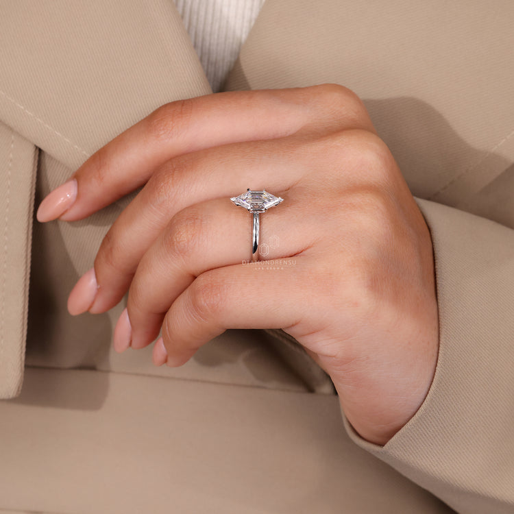 Lab grown diamond ring featuring elongated hexagon step cut.