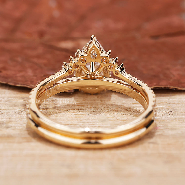 Pear and round diamond bridal set.
