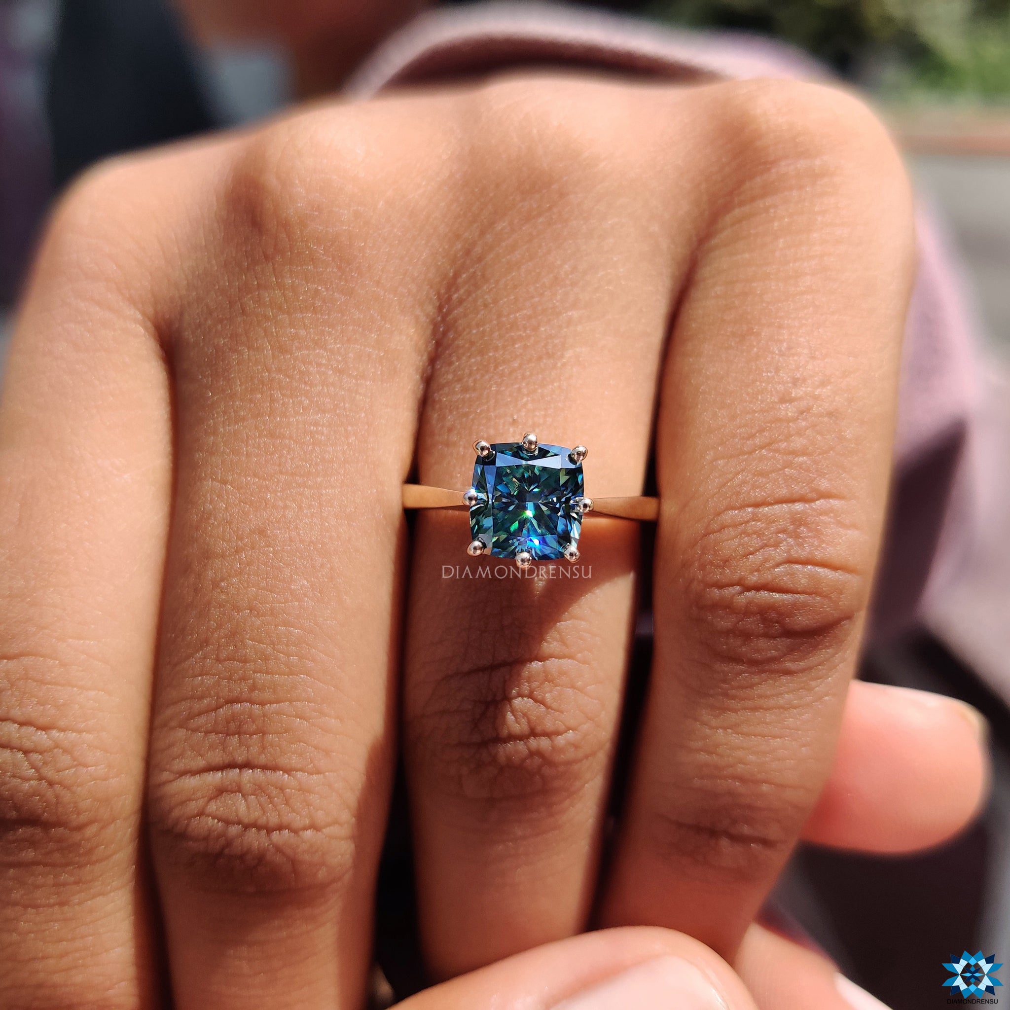 Buy engagement ring with cushion cut moissanite and hidden halo feature.
