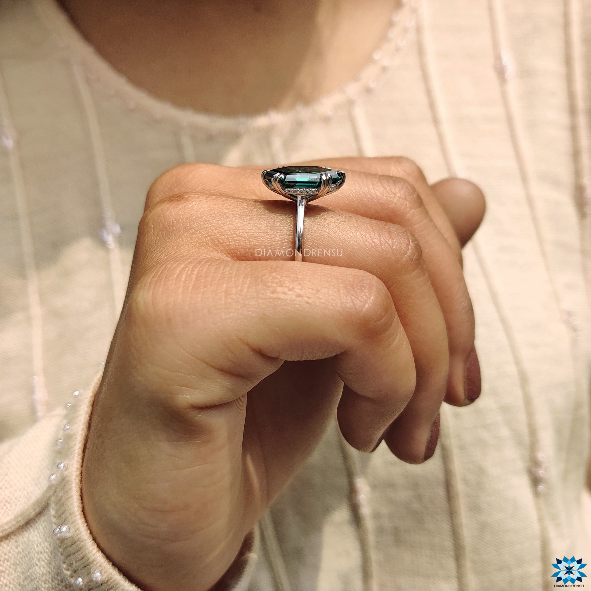 Handmade jewellery featuring unique green moissanite and claw prong finish.
