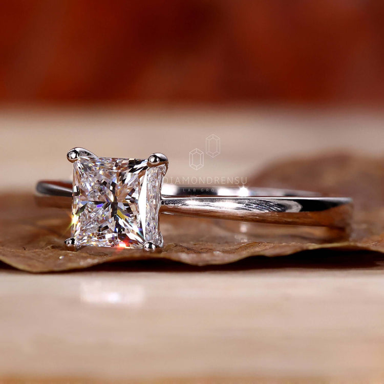 Handmade princess cut solitaire engagement ring in UK.
