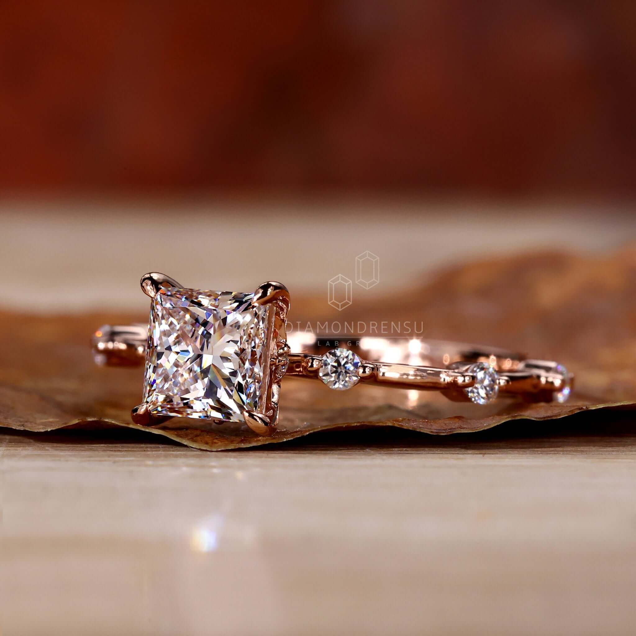 Handmade princess cut pave engagement ring with lab-grown diamonds.