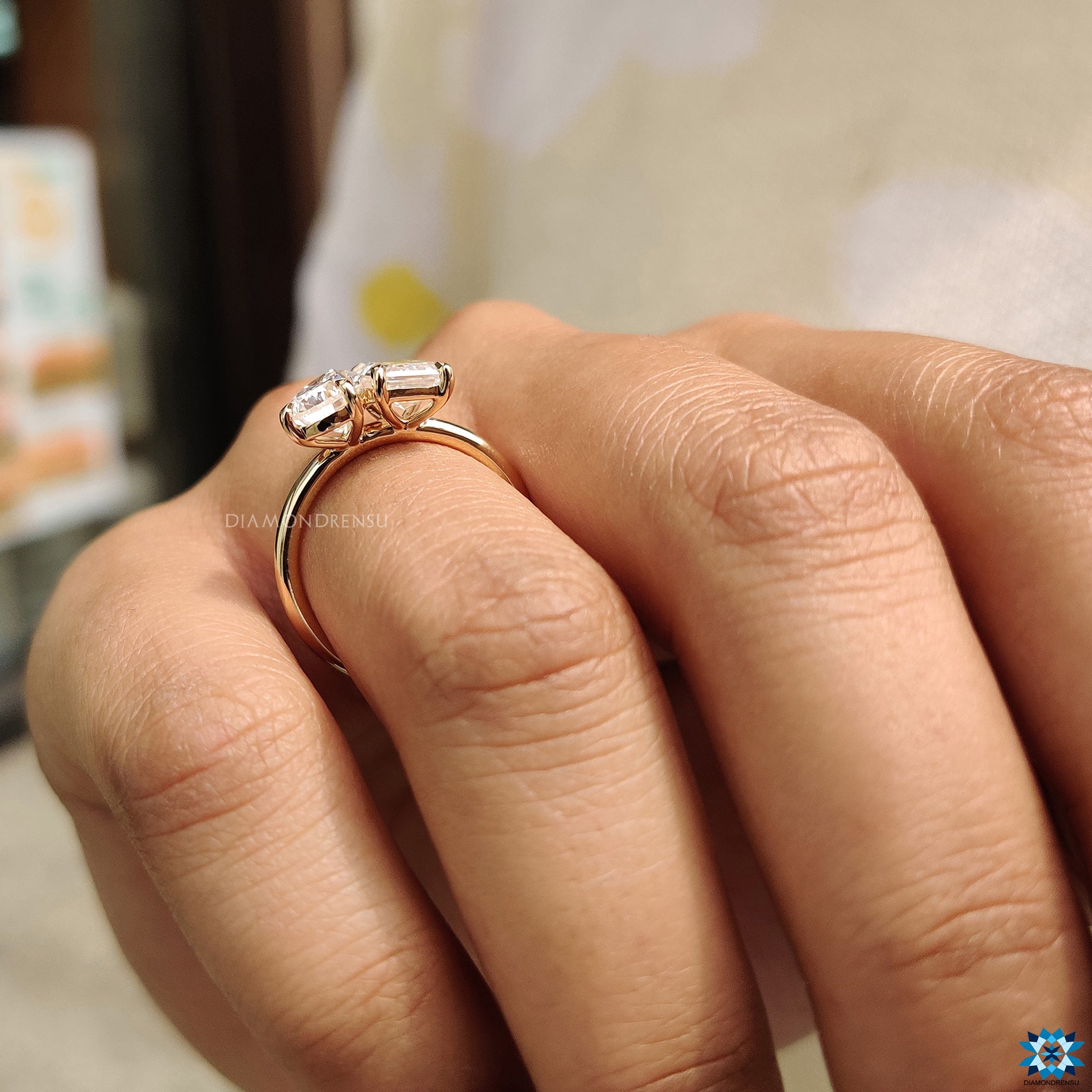 Yellow gold ring in toi et moi engagement ring design
