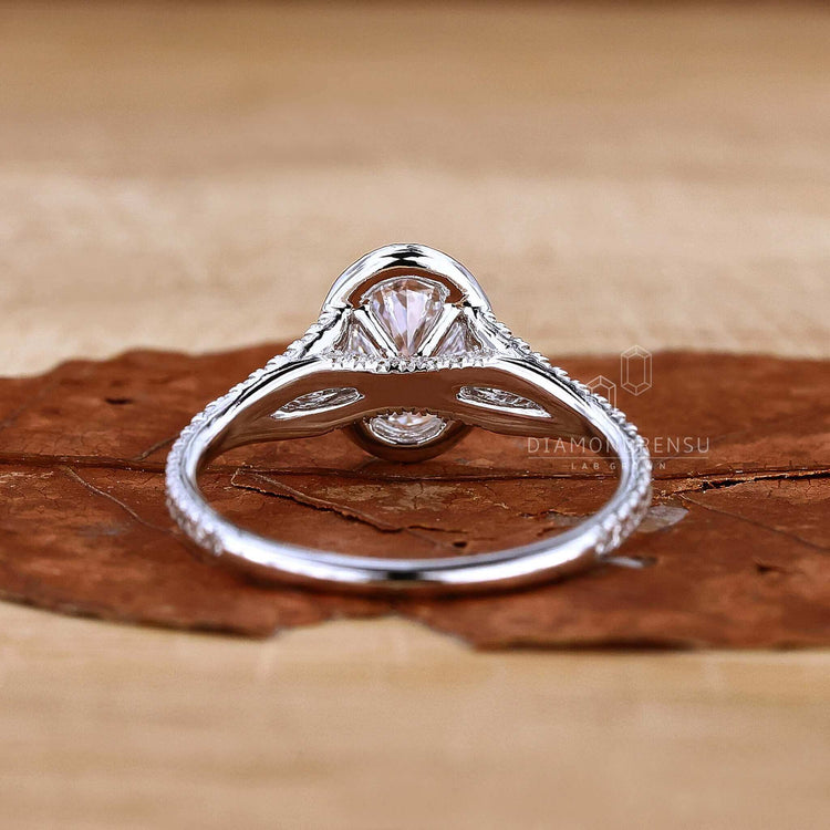 Engagement rings oval with 2 ct diamond in a split shank design.
