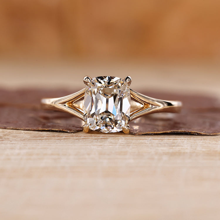 Cushion Old Mine Cut Diamond used as center stone in solitaire ring.