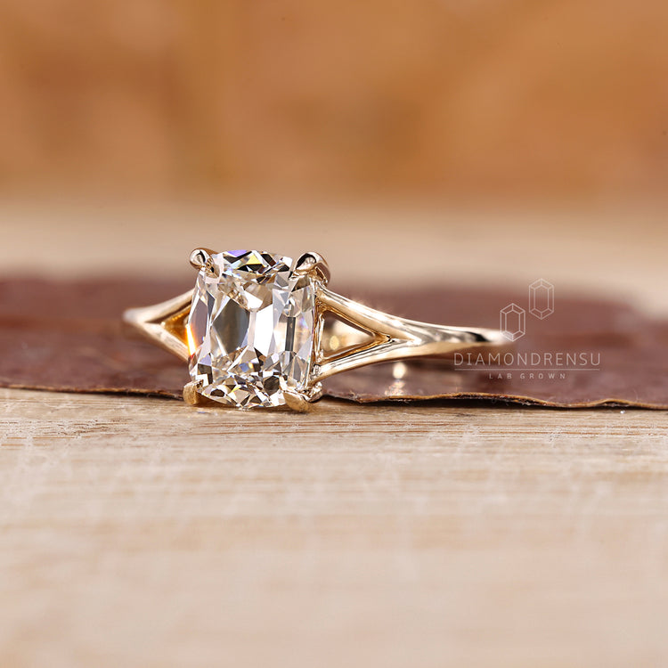 UK engagement ring with old mine cut cushion diamond.