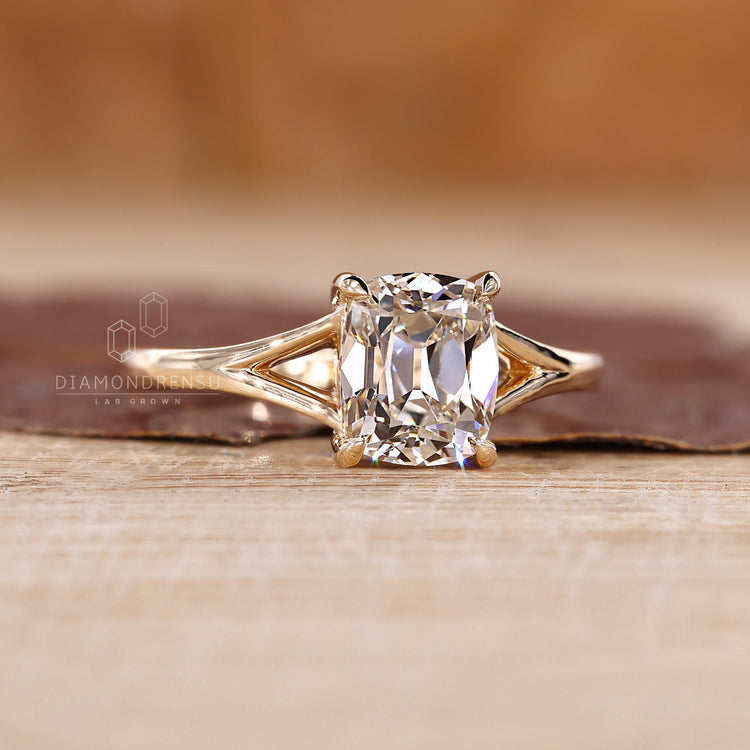 Lab grown diamond engagement ring with split shank setting.